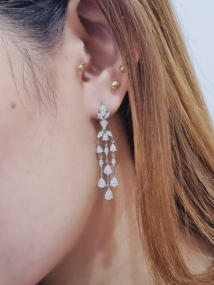 Dangling Diamond Cluster Earrings In 18k White Gold.