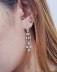 Dangling Diamond Cluster Earrings In 18k White Gold.