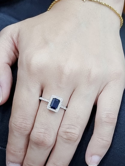 Halo Sapphire And Diamond Ring In 18k White Gold.