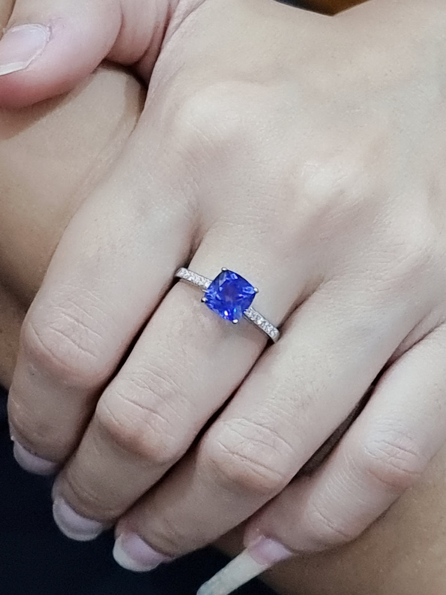 Solitaire Tanzanite And Diamond Ring In 18k White Gold.
