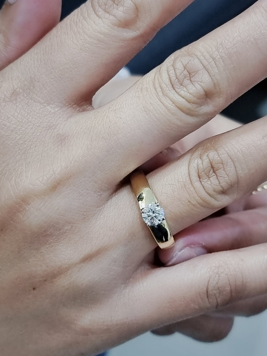 Wide Band Solitaire Diamond Ring In 18k Yellow Gold.