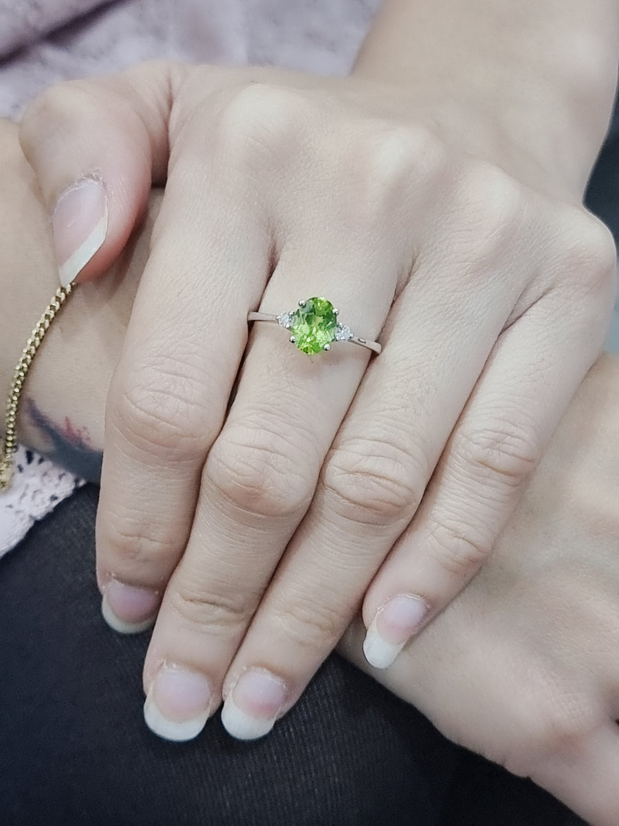 Solitaire Peridot And Diamond Ring In 18k White Gold.