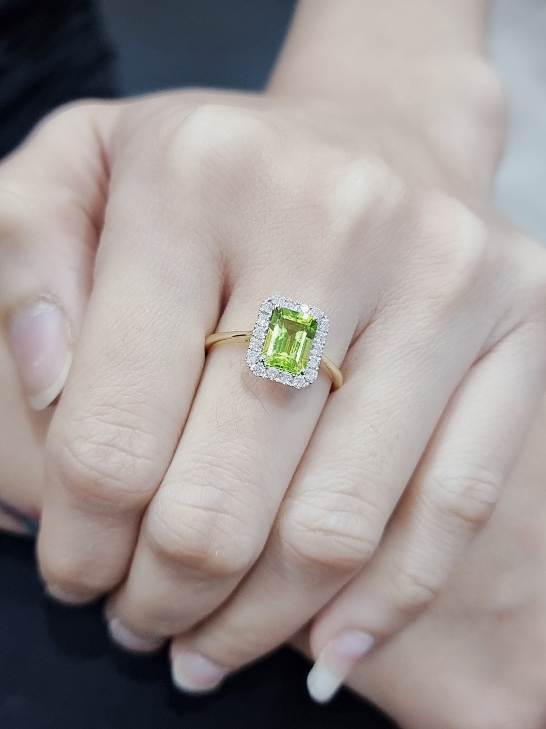 Peridot And Diamond Halo Ring In 18k Yellow Gold.