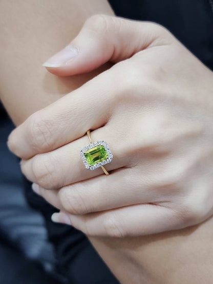 Peridot And Diamond Halo Ring In 18k Yellow Gold.