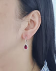 Pear Shaped Rubies Dangling From Diamond Huggies, Earrings In 18k White Gold.