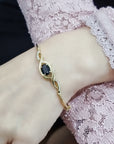 Art Deco Style, Sapphire And Diamond Bangle Bracelet In 18k Yellow Gold.