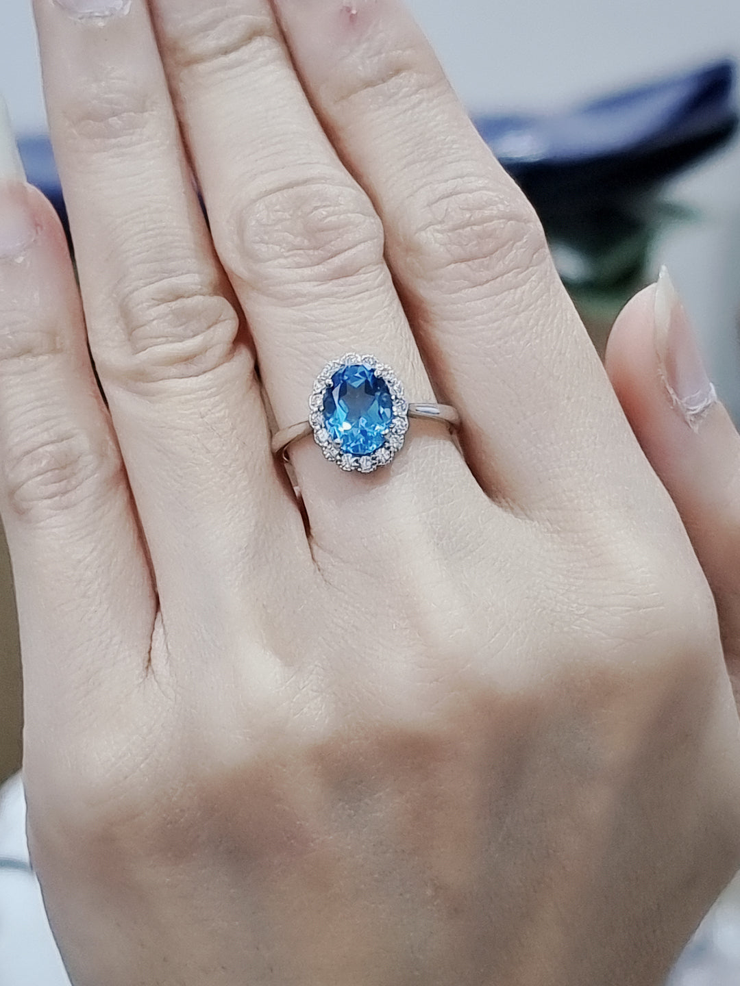 Blue Topaz And Diamond Ring In 18k White Gold.