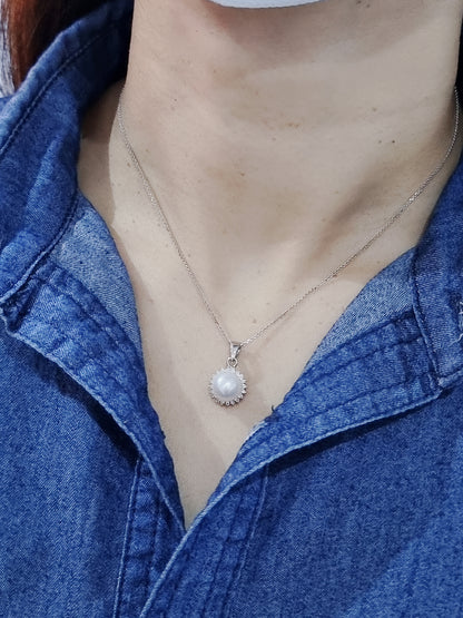 Fresh Water White Pearl And Diamond Pendant In 18k White Gold.