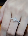 Solitaire Pear Shape Diamond Ring In 18k White Gold.