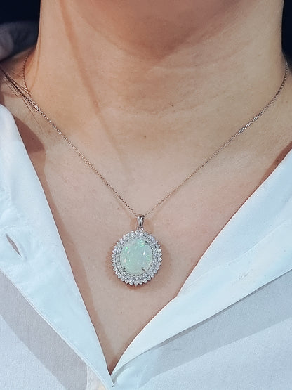 Opal And Diamond Pendant In 18k white Gold.