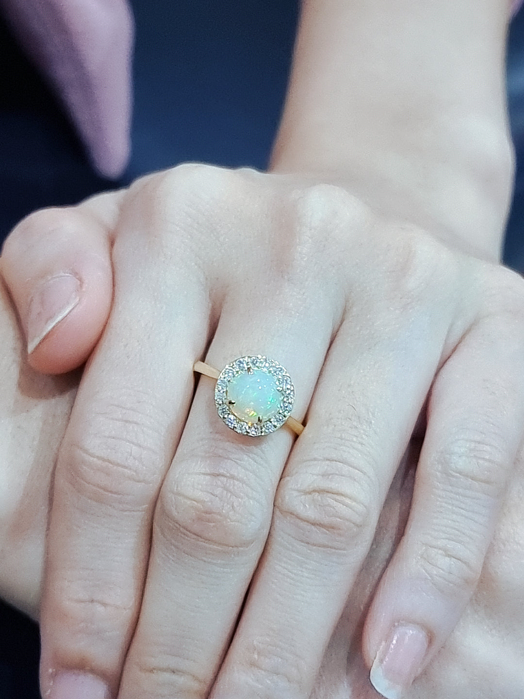 Round Opal And Diamond Halo Ring In 18k Yellow Gold.