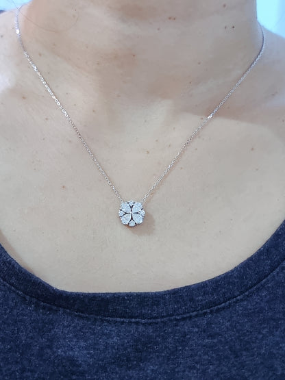 Complete Your Out Fit Of The Day With This Chic Necklace. Designed In A Floral Motif And Set With A Lovely Combination Of Round And Pear Shaped Diamonds. A Stunning Piece That You Can Wear As Is Or Style It By Layering It With Other Necklaces. 