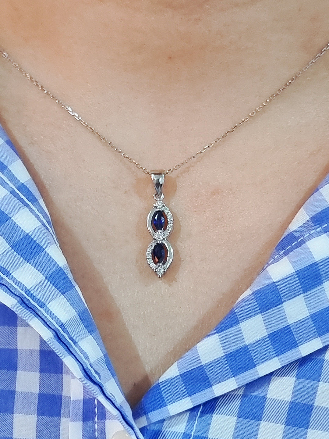 Sapphire And Diamond Pendant In 18k White Gold.