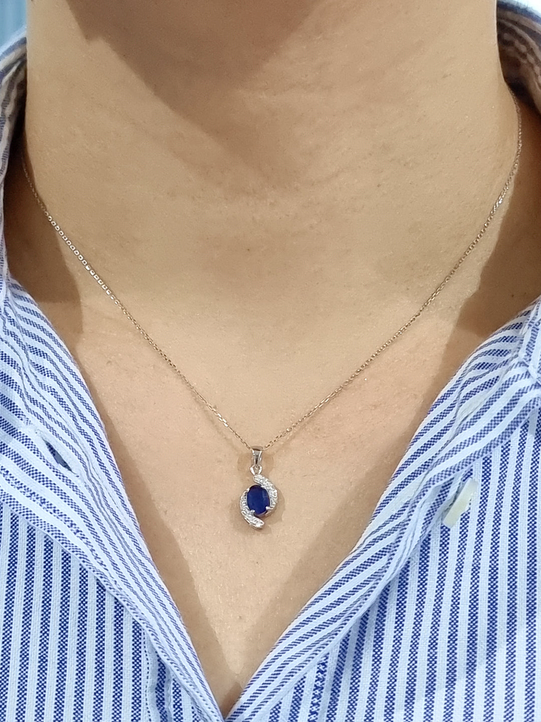 Petite Blue Sapphire And Diamond Pendant In 18k White Gold.