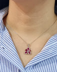 July Birthstone, Ruby And Diamond Flower Pendant In 18k white Gold.