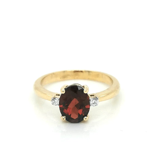 Garnet And Diamond Ring Crafted In18K Yellow Gold