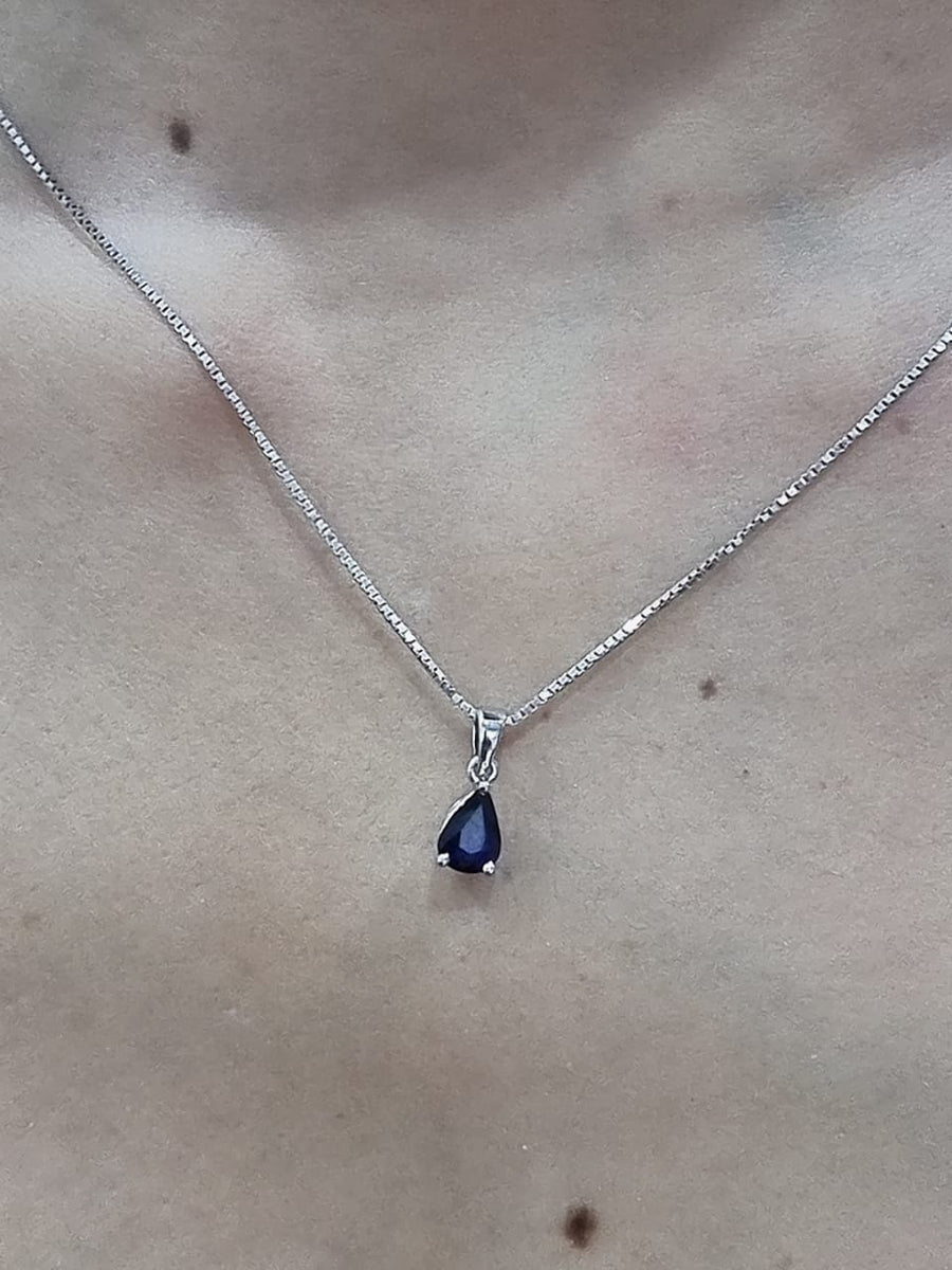 Pear Shape Blue Sapphire Pendant Crafted In 18K White Gold