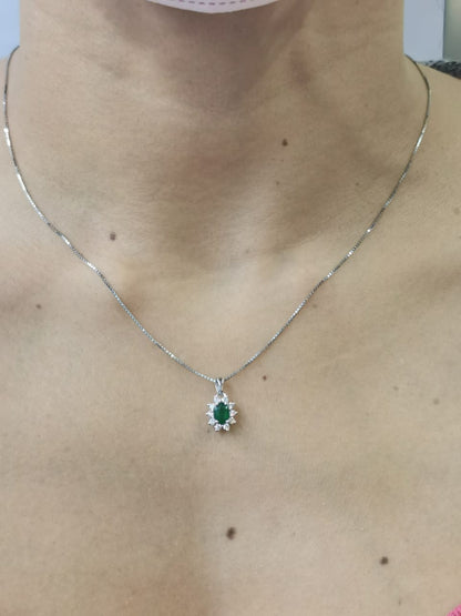 Emerald And Diamond Pendant Crafted In 18K White Gold