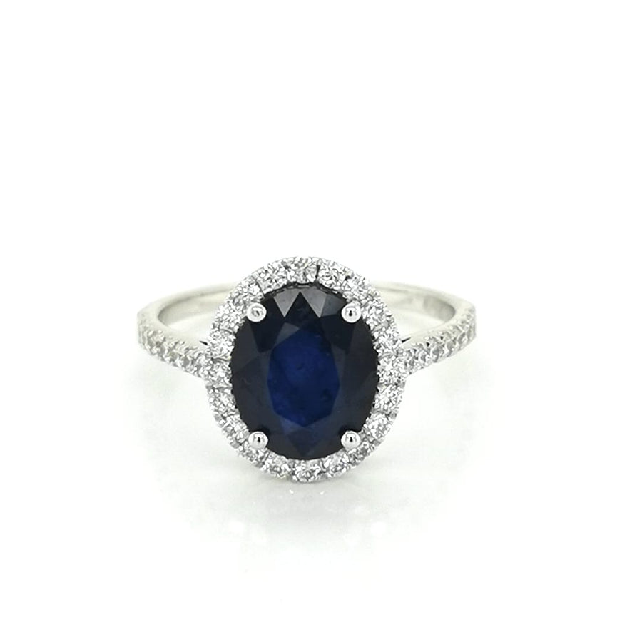 Blue Sapphire And Diamond Ring Crafted In 18K White Gold
