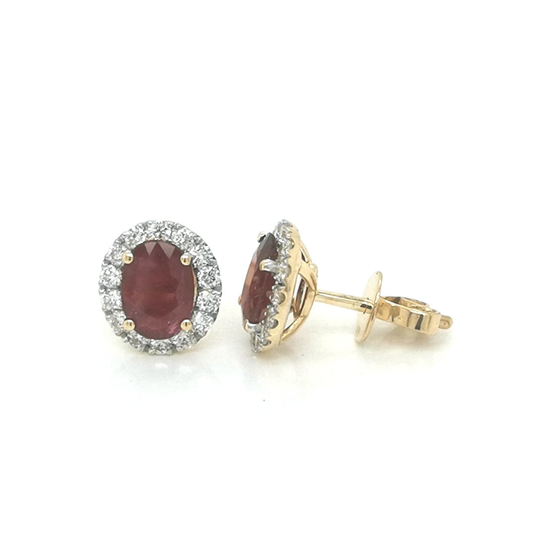 Oval Ruby And Diamond Earrings In 18k Yellow Gold.