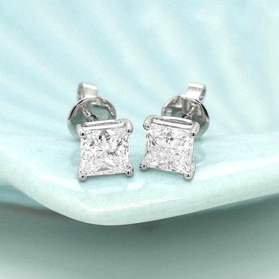Solitaire Princess Cut Diamond Earrings In 18k White Gold.