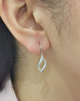Dangling Diamond Earrings Crafted In 18K White Gold