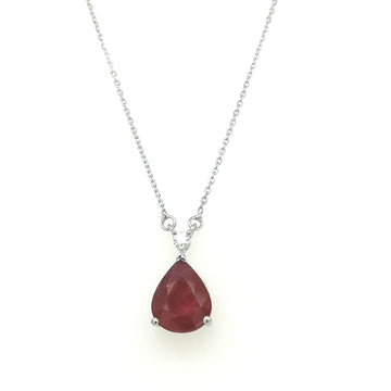 Ruby And Diamond Pendant In 18k White gold.