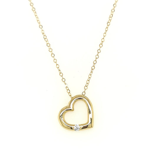 Single Diamond Heart Pendant In 18k Yellow Gold.