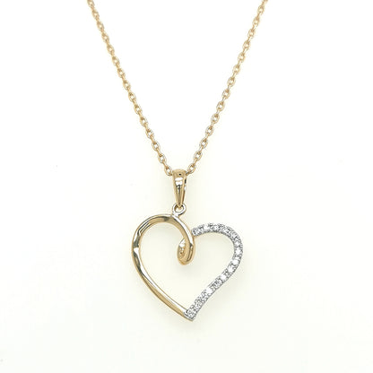 Heart Shape Diamond Pendant In 18k Yellow Gold.