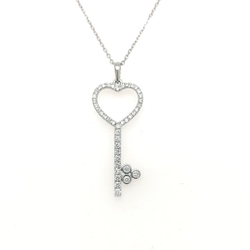 Diamond Heart Key Pendant In 18k White Gold.