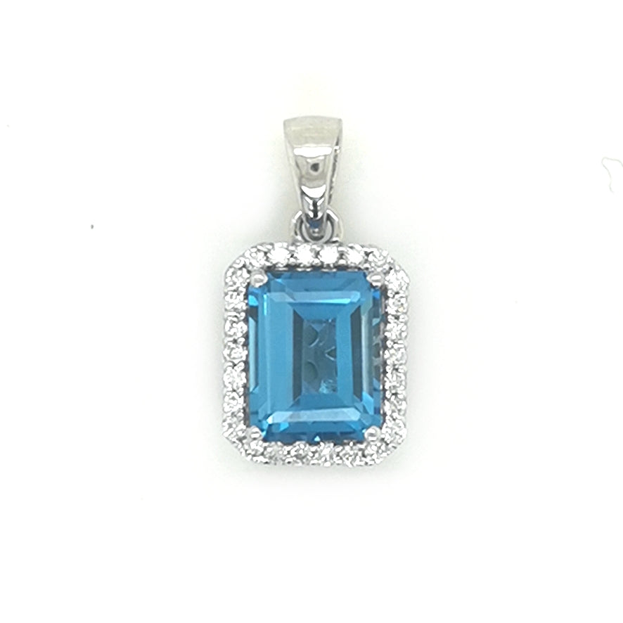 Blue Topaz And Diamond Pendant In 18k White Gold.