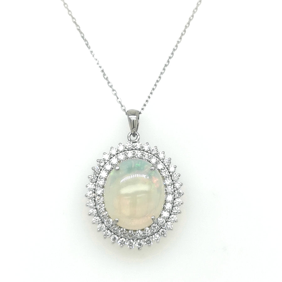 Opal And Diamond Pendant In 18k white Gold.