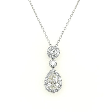 A Diamond Necklace Is An Essential Part Of A Woman's Jewellery Collection, And This Pendant Necklace Is A Great Way To Add A Little Sparkle... Featuring A Modern Design With A Beautiful Combination Of Pear And Round Cut Diamonds. Crafted In 18k White Gold And Comes With A Chain. 